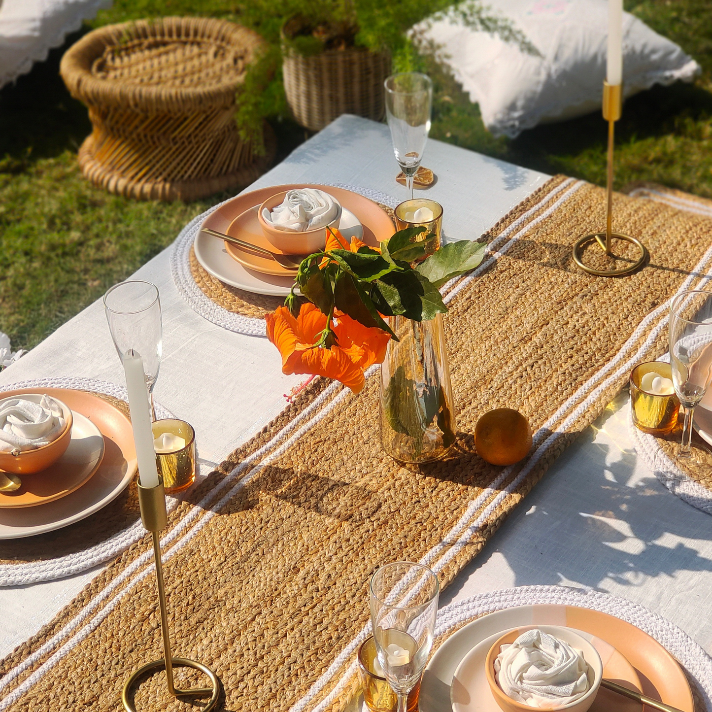 Outdoor picknick setup from Jute dining table runner with placemats